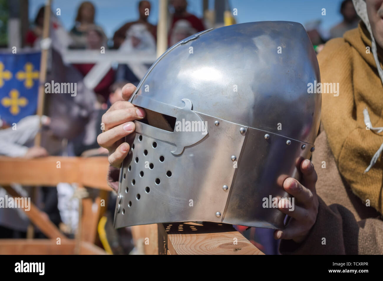 The man on the Knight Tournament holdind a knights helmet Stock Photo