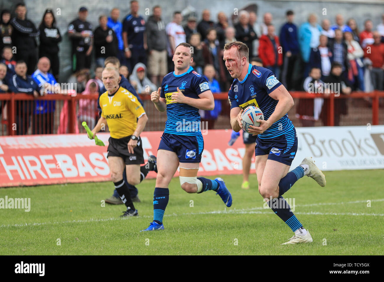 9th June 2019 , KCOM Craven Park, Hull, England;  Betfred Super League, Round 17, Hull KR vs Wigan Warriors ; Dan Sarginson (3) of Wigan Warriors breaks through to score Wigans second try  Credit: Mark Cosgrove/News Images Stock Photo