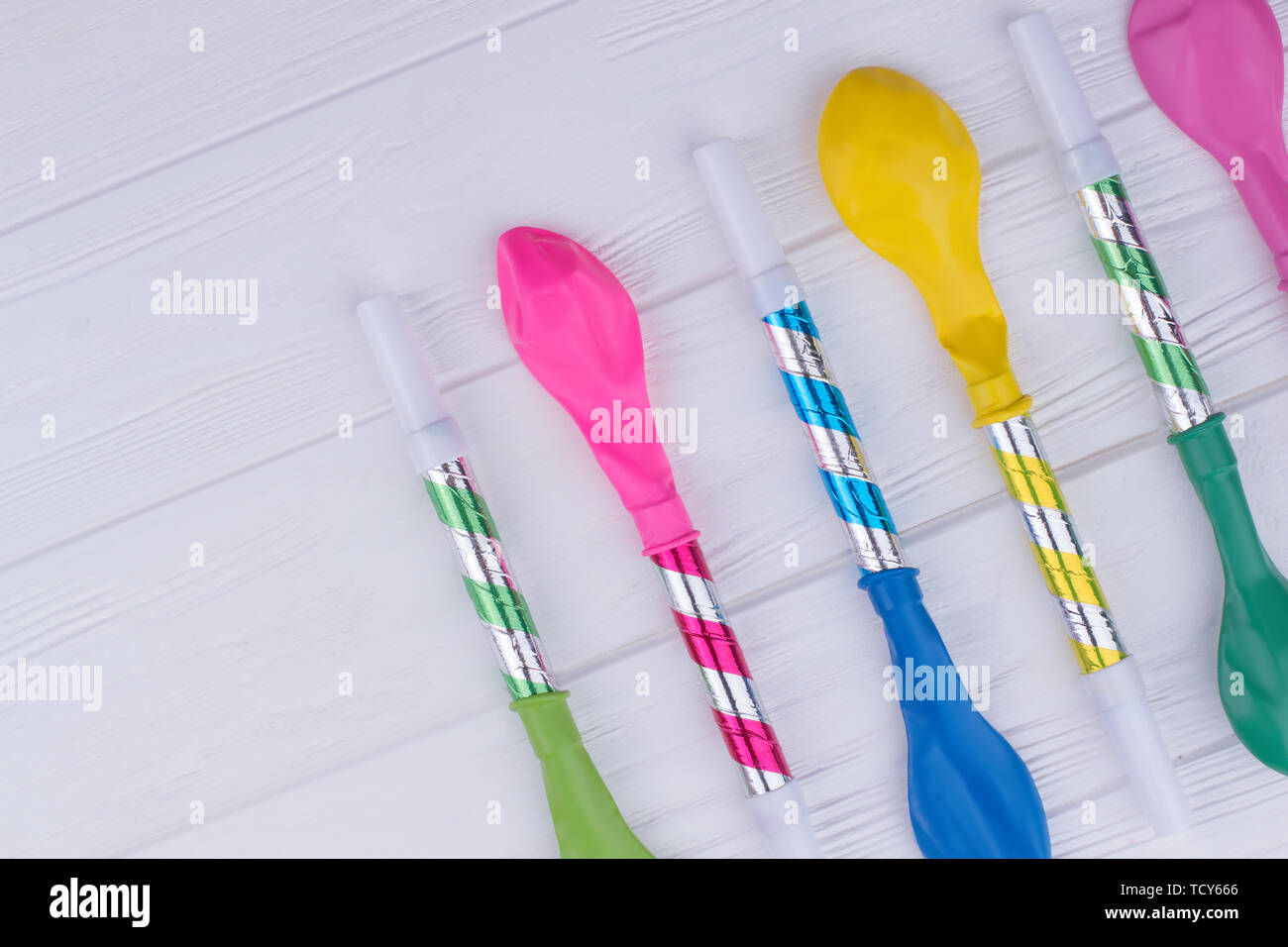 Party background with balloons and blowers Stock Photo - Alamy
