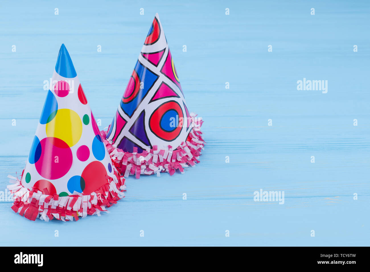 Two funny party hats with copy space 