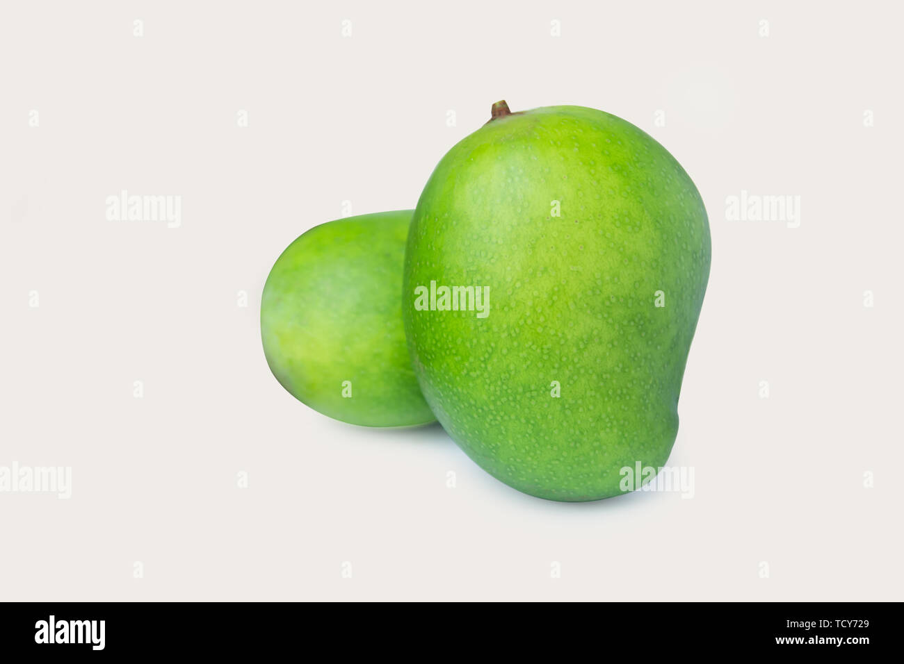 Green mango isolated on white background with clipping path Stock Photo