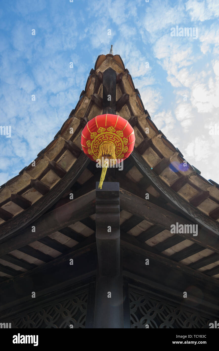 Red lanterns under the eaves Stock Photo - Alamy