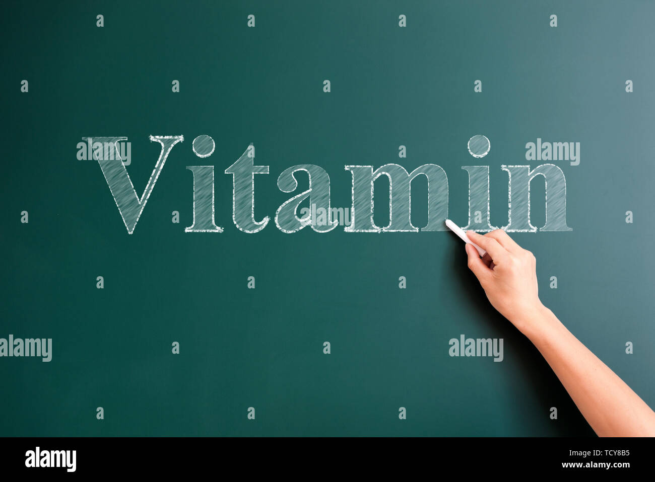 vitamin written on blackboard Stock Photo