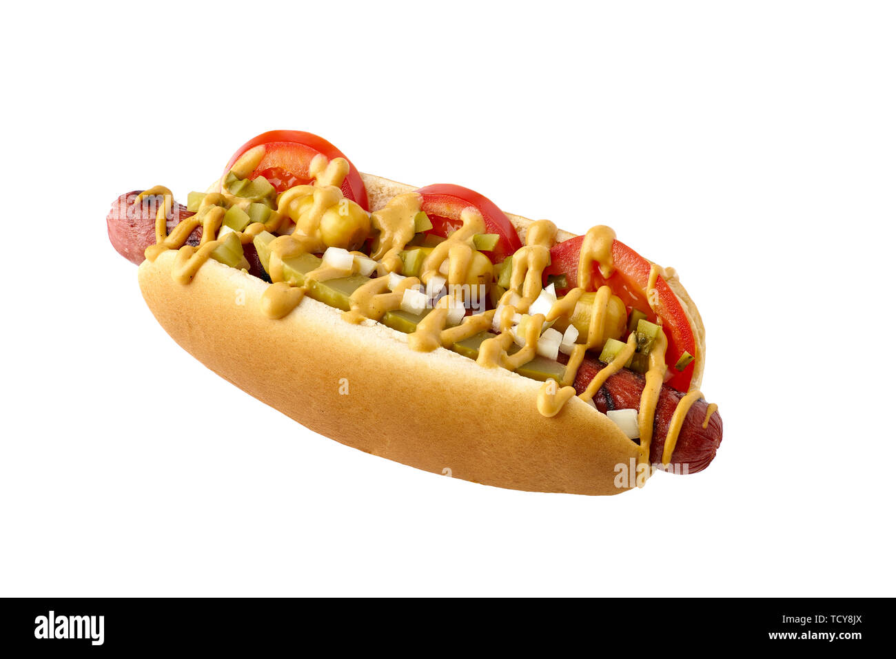 Tasty hot dog with tomatoes and pickled relish on white Stock Photo Alamy