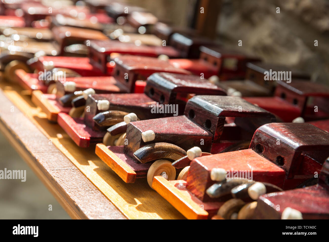 Souvenirs from Lagich. Wooden toys, retro old cars. Sale of Souvenirs for tourists. Stock Photo