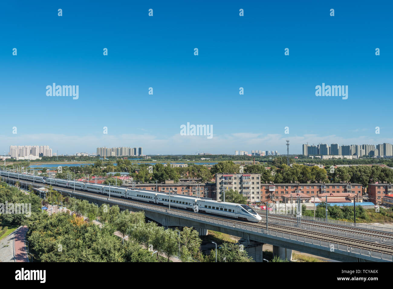 Songhua River Railway Bridge under Autumn Sunny Day in Harbin, China Stock Photo