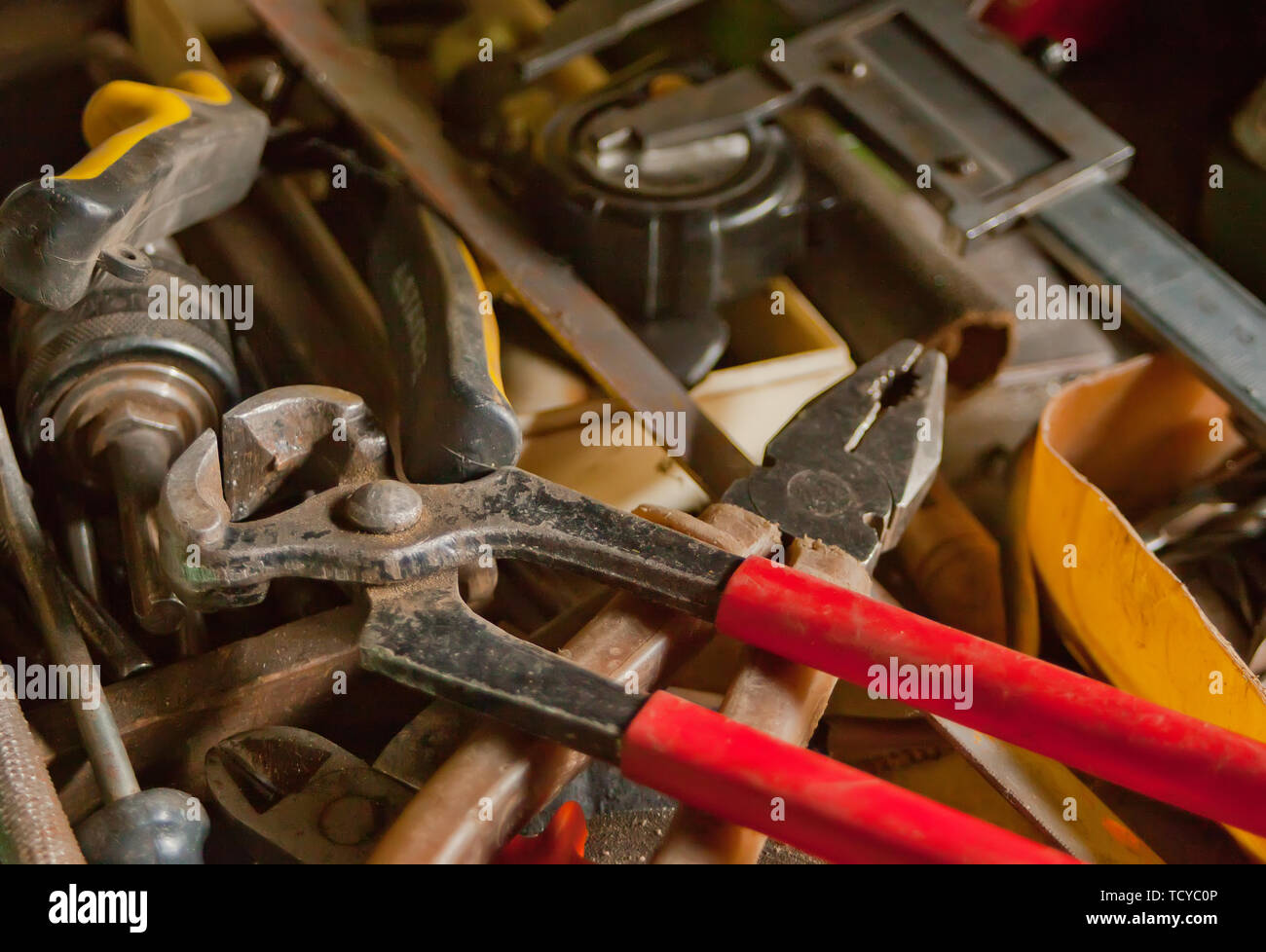 Collection of vintage carpentry tools on an old workbench: woodworking, craftsmanship and handwork concept, flat lay Stock Photo