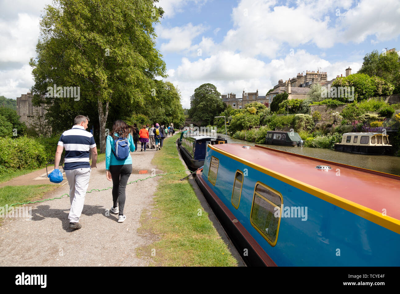 People walking outdoors in Summer UK - example of healthy lifestyle, Kennet and Avon Canal, Bath England Stock Photo