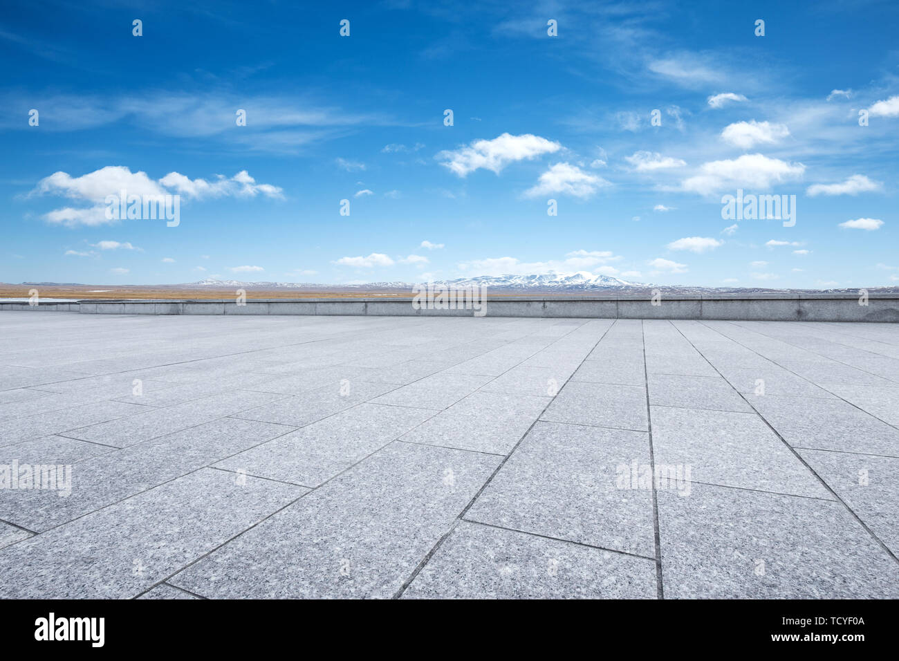 Empty marble floor with snow mountains Stock Photo