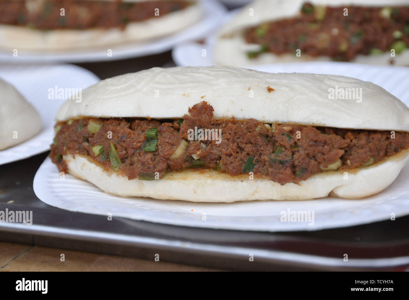 Loaf cake with meat sauce. Stock Photo