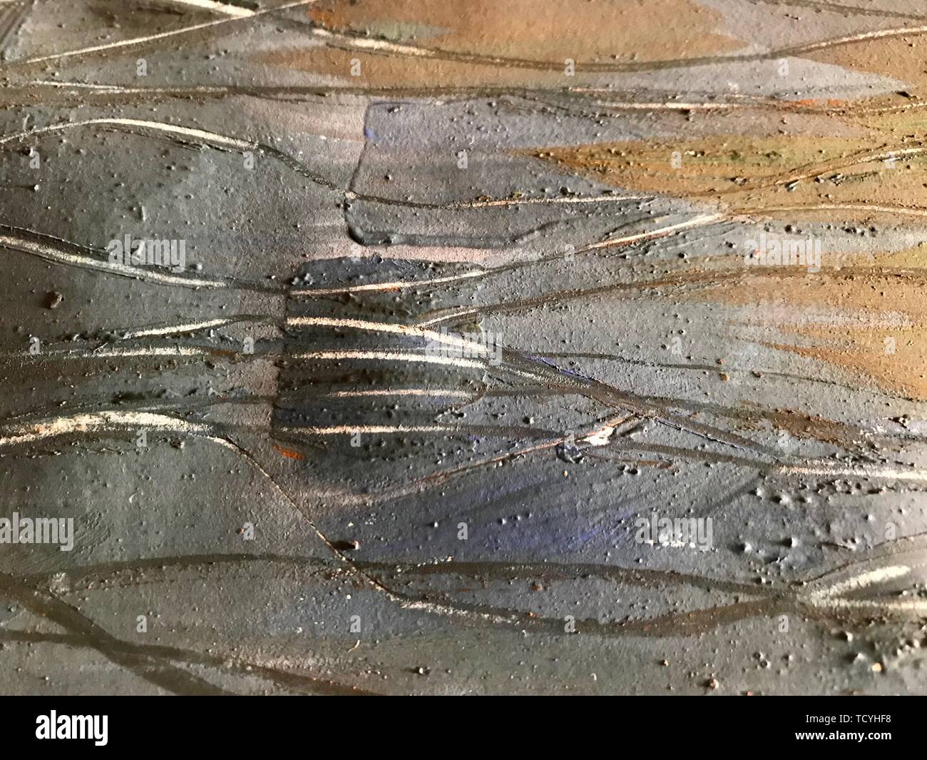 Light blue gold painting texture, creating flowing lines on the ...