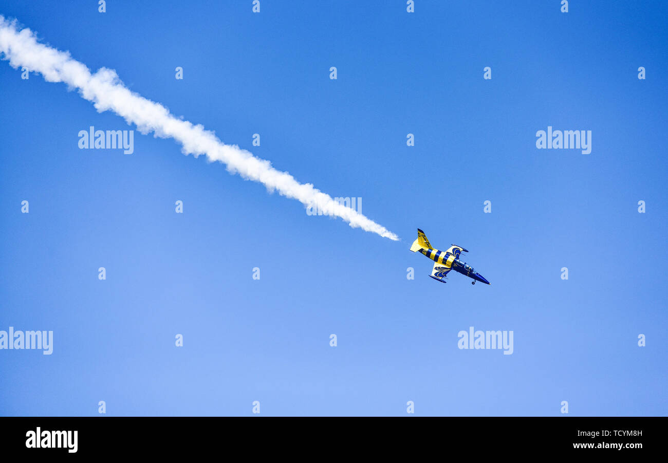 Plane show on the blue sky Stock Photo - Alamy