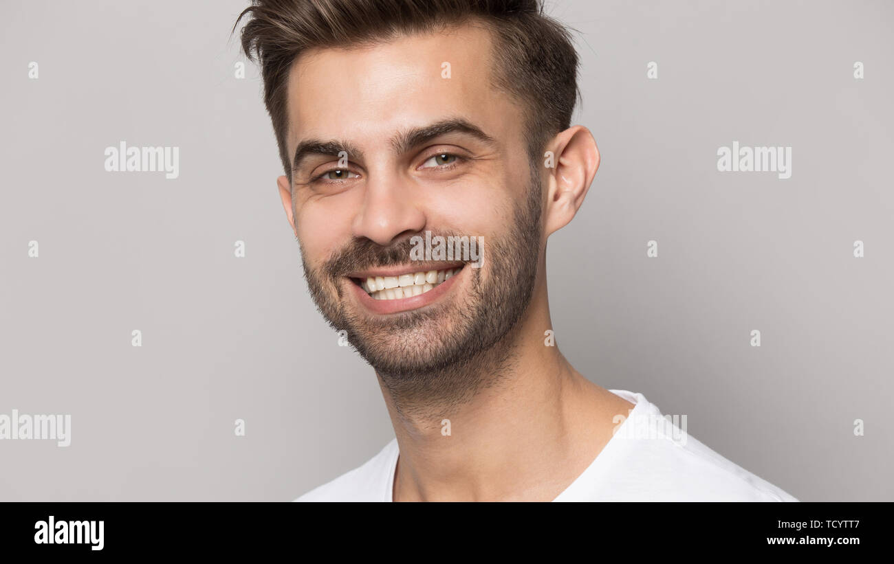 Closeup portrait young man with white toothy smile Stock Photo - Alamy