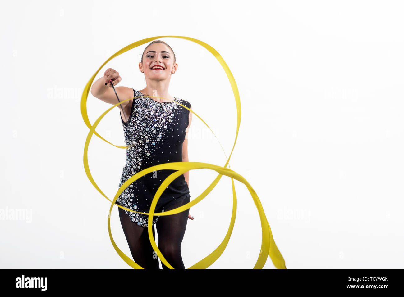 Woman with ribbon for rhythmic gymnastic. Fitness and dieting of girl