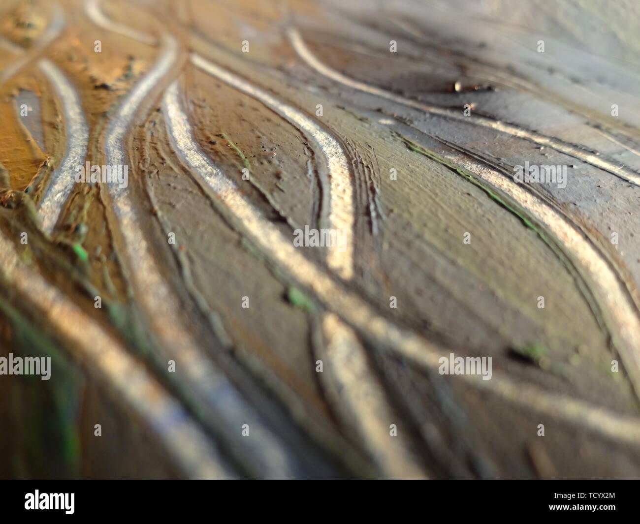 Light blue gold painting texture, creating flowing lines on the ...