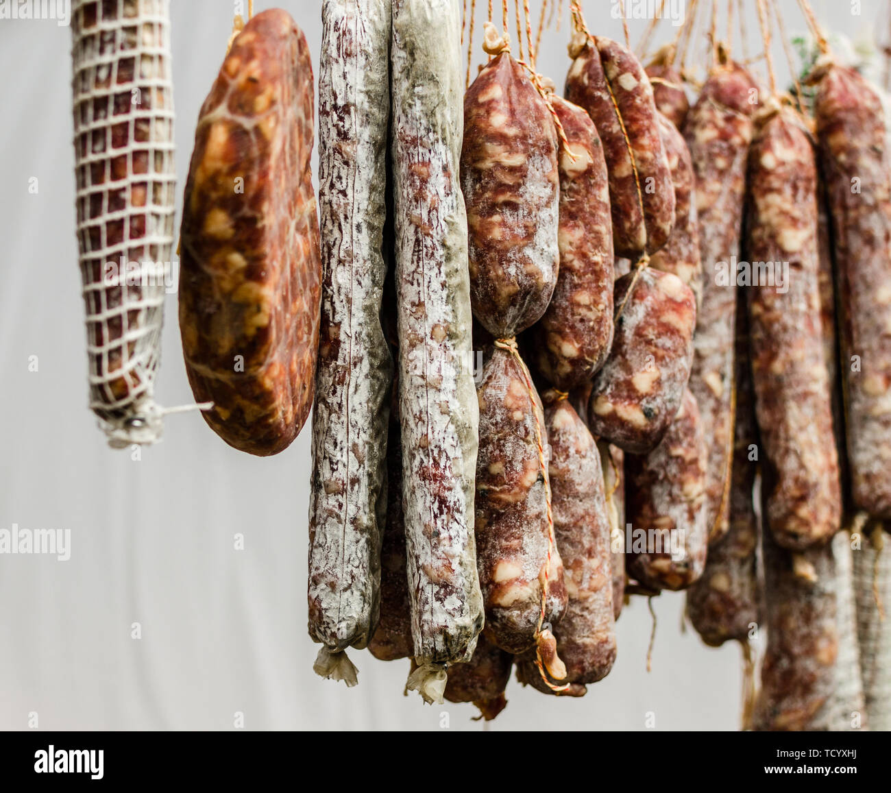 Traditional Italian delicatessen salami sausage at a street food market