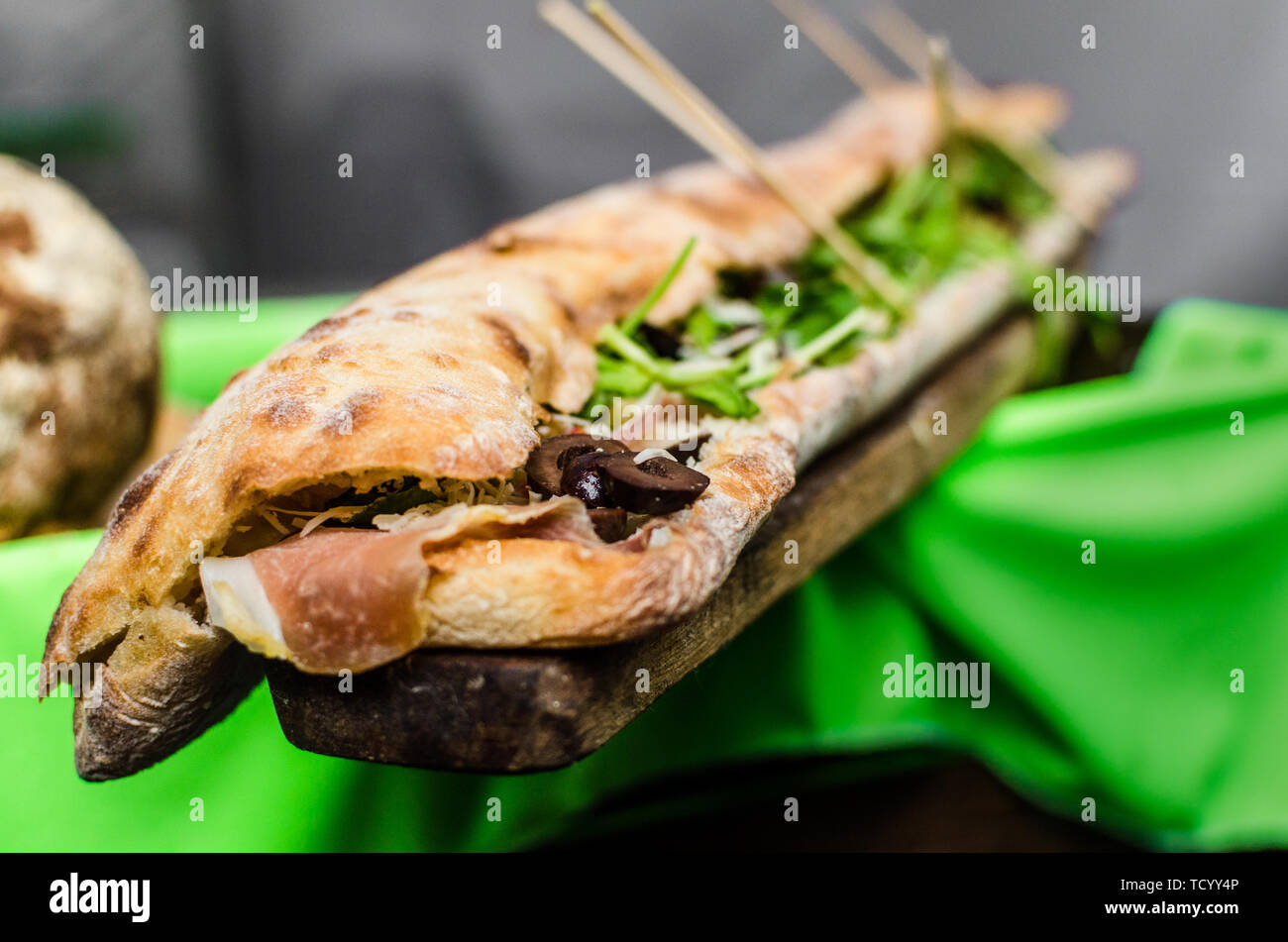 Close up of huge panini sandwich at a street food market Stock Photo