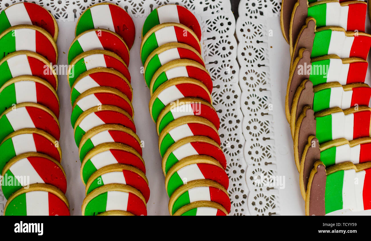 Flat lay top view of colorful cookies with Italian flags Stock Photo