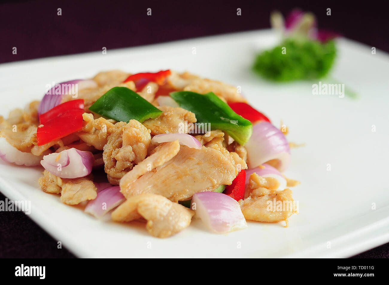 Stirfried chicken slices Stock Photo Alamy
