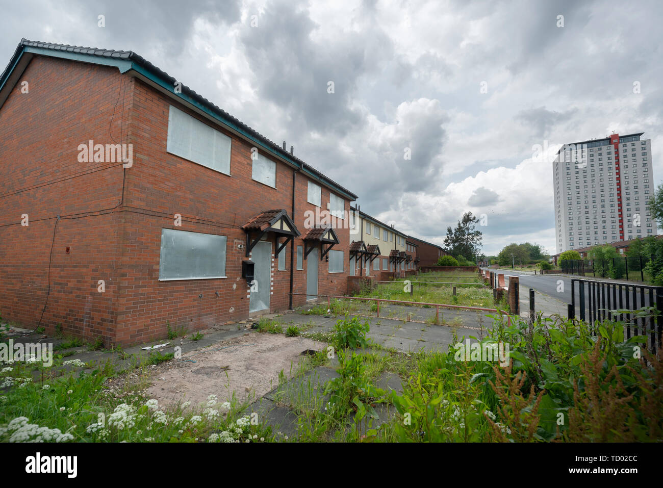 Boarded up houses on the High Street Estate area of Pendleton in Salford, which are awaiting demolition. Stock Photo