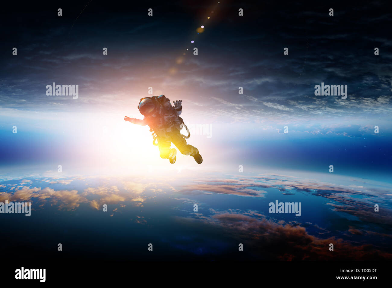 Spaceman and planet, human in space concept Stock Photo - Alamy