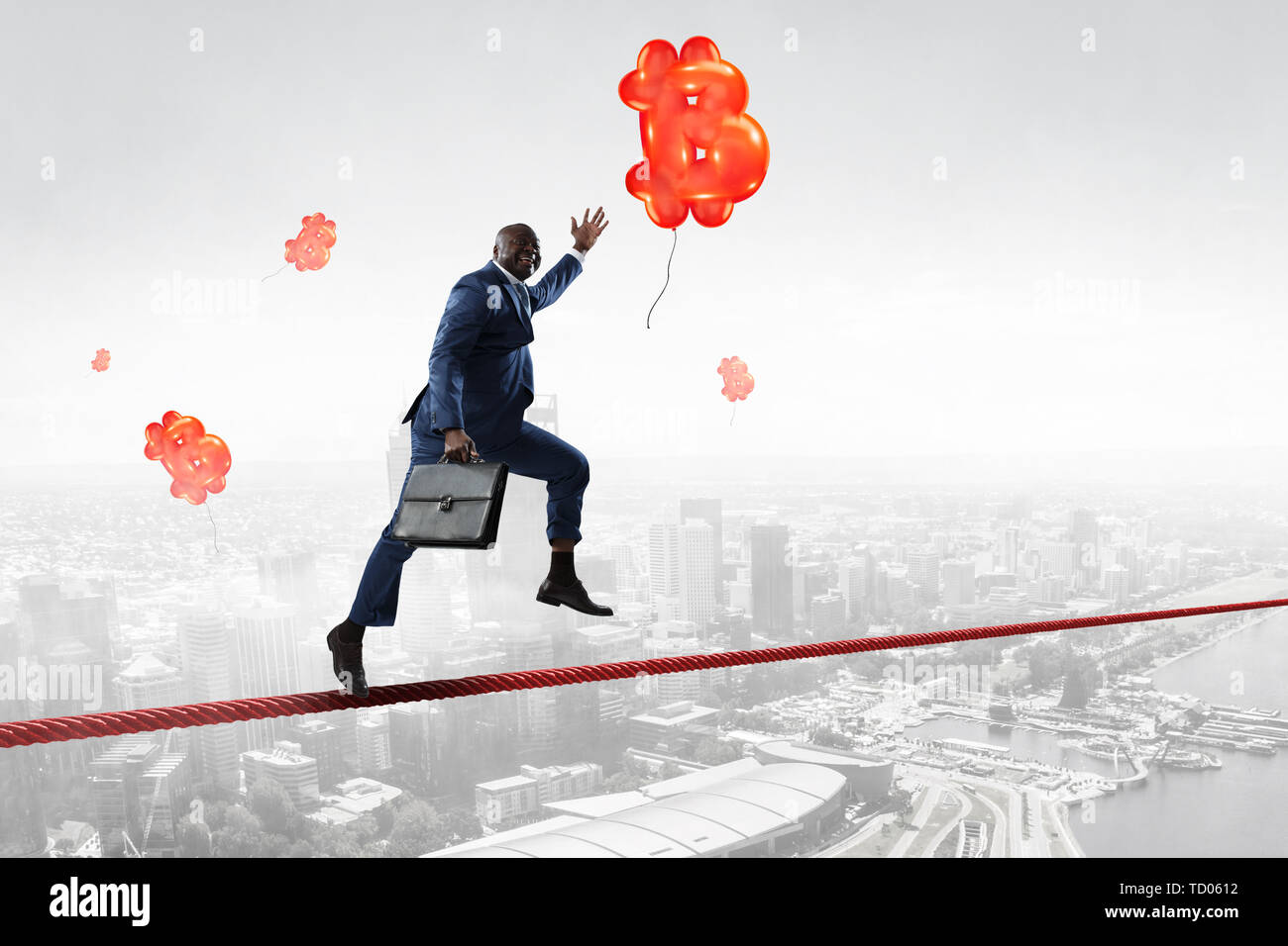 Running black businessman with briefcase Stock Photo - Alamy