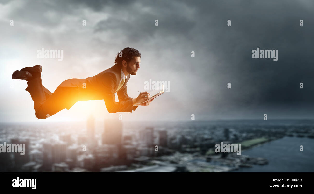 Businessman levitating hi-res stock photography and images - Alamy