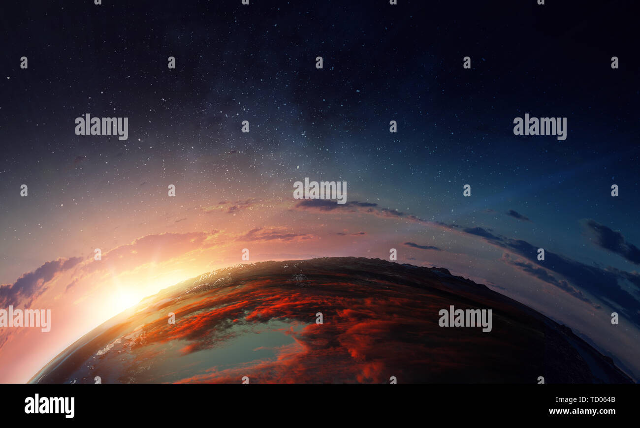 Earth with sunrise on blue space background Stock Photo - Alamy
