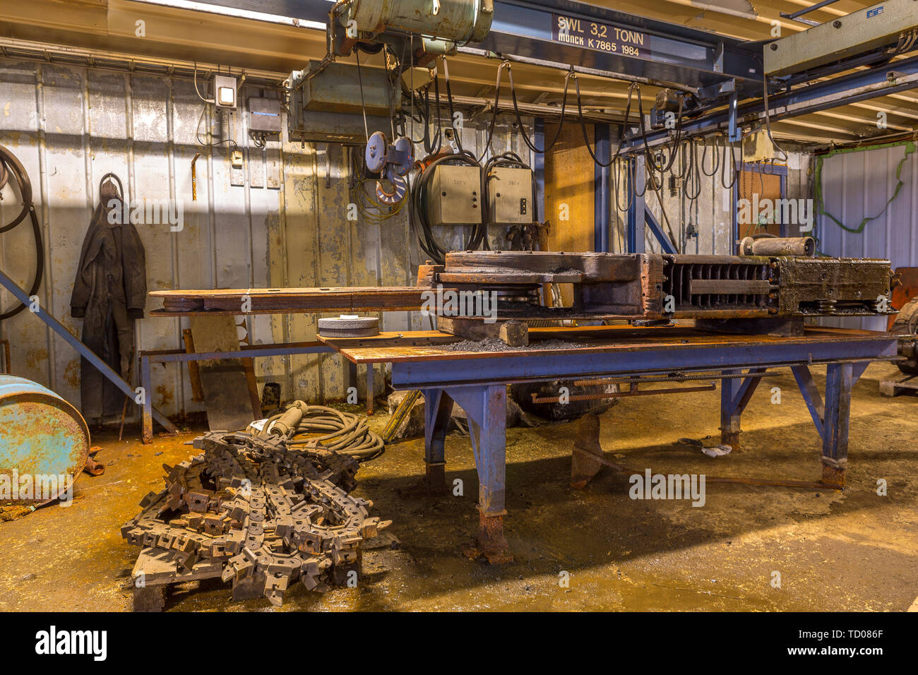 Mix of vintage and modern tools at work station in underground coal ...
