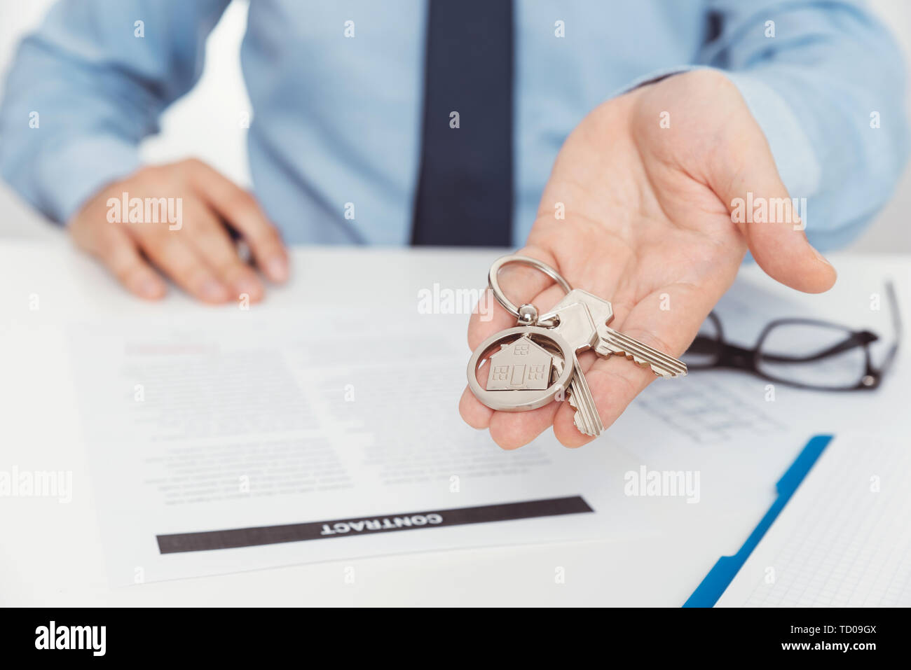 Real estate agent with home keys. Buying a new apartment concept Stock Photo