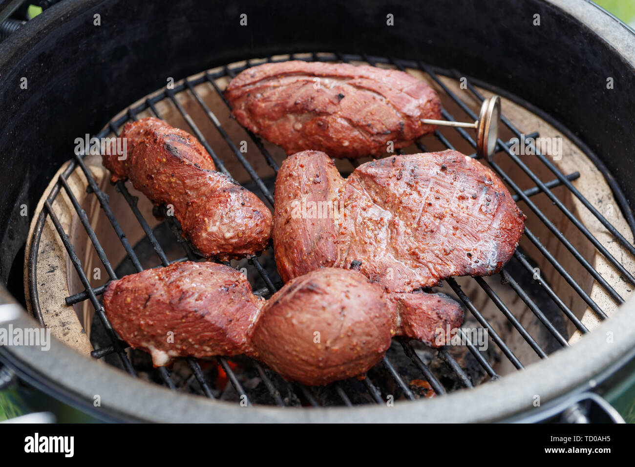 https://c8.alamy.com/comp/TD0AH5/chunks-of-meat-on-charcoal-grill-TD0AH5.jpg