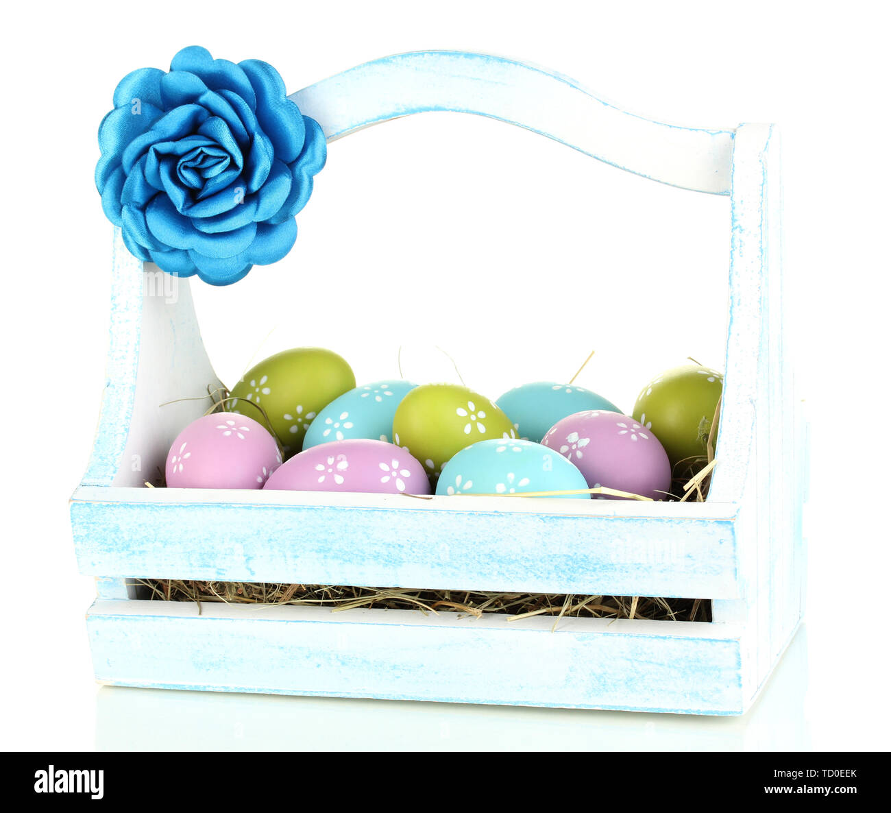 Easter eggs in wooden basket isolated on white Stock Photo - Alamy