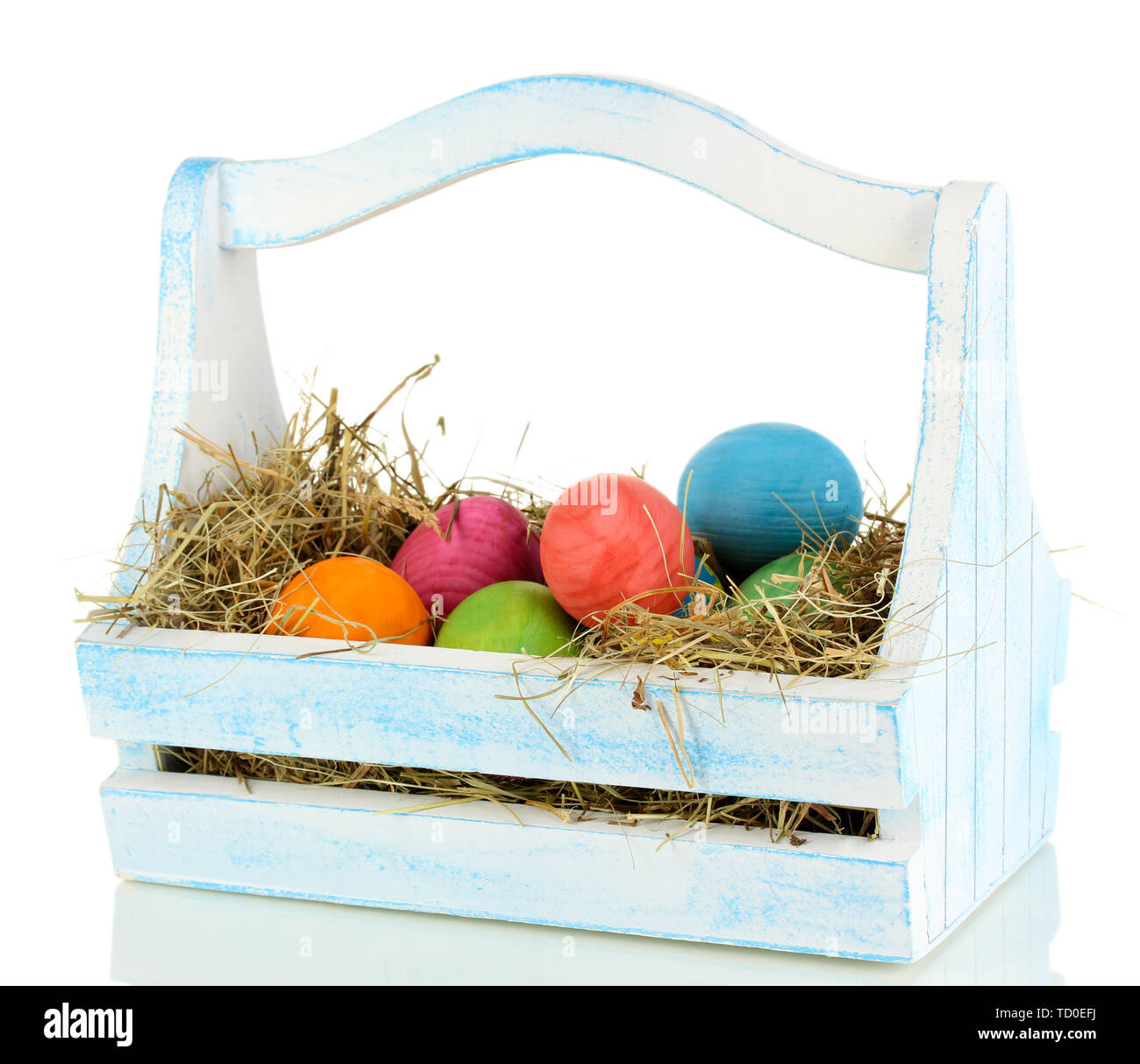 Easter eggs in wooden basket isolated on white Stock Photo - Alamy