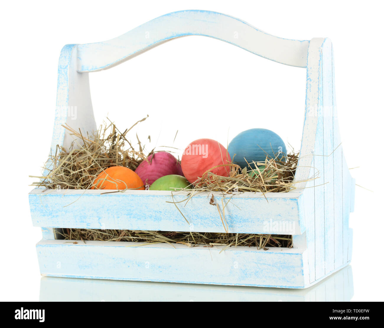Easter eggs in wooden basket isolated on white Stock Photo - Alamy