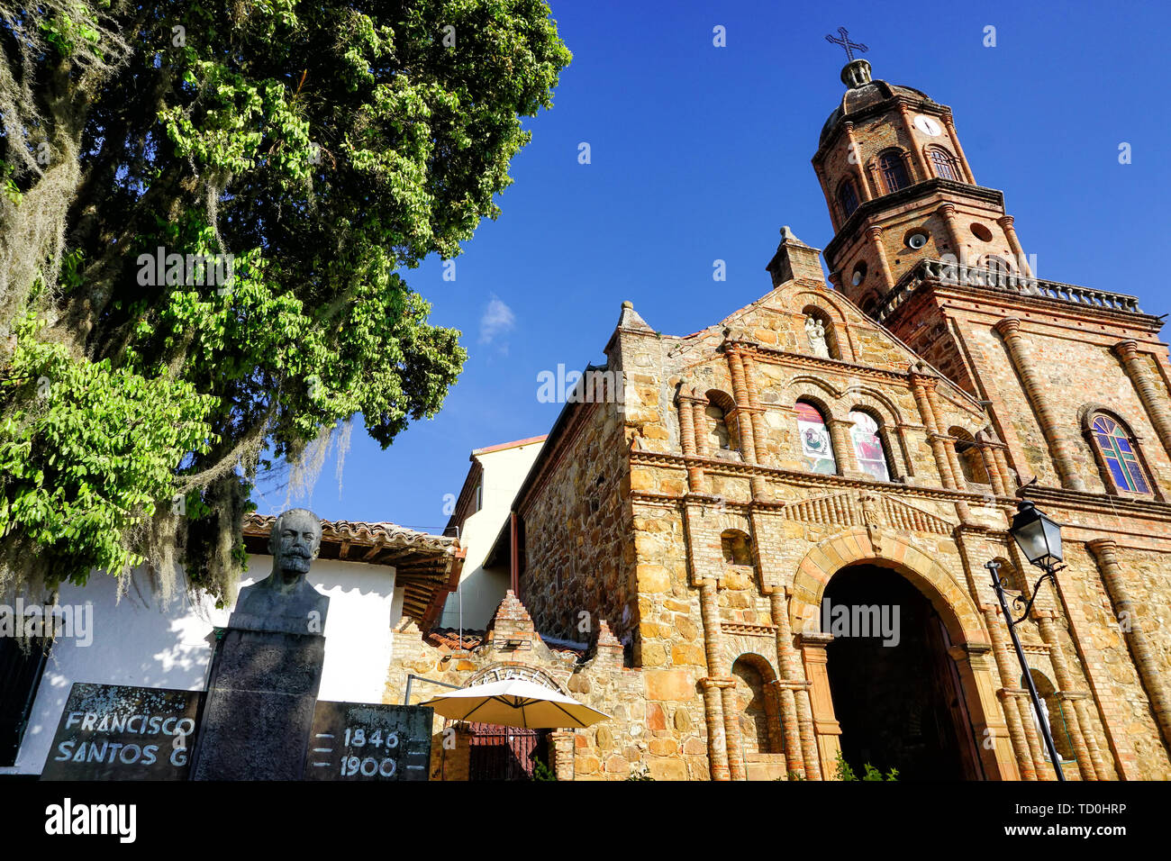 San Joaquin church entrance with Francisco Santos sculpture in Curiti, Santander, Colombia Stock Photo