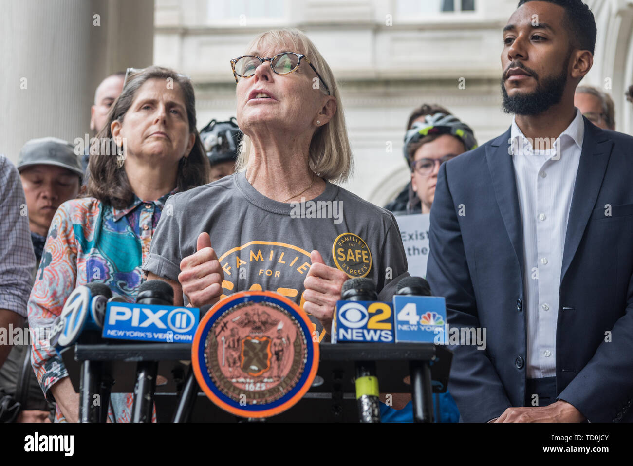 New York, USA. 10th June, 2019. Mary Beth Kelly of Families for Safe Streets recounting the day her husband was struck by a truck while biking and who died 3 days later of the injuries he had sustained. - On June 10, 2019, NYC Council Member Antonio Reynoso held a press conference alongside NYC Council Member Helen Rosenthal and safer streets advocates at NY City Hall addressing a recent incident where a motorist attempted to run over a cyclist near the Hudson River Greenway. Credit: PACIFIC PRESS/Alamy Live News Stock Photo