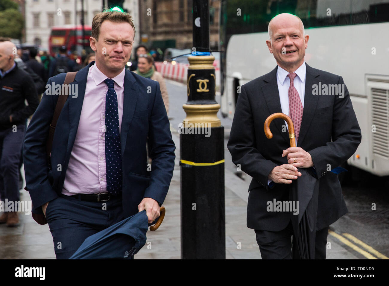 London, UK. 10 June, 2019. William Hague (r), life peer and former Leader of the Opposition, arrives at Parliament on the day that the final list of candidates for the Conservative Party leadership was confirmed. Credit: Mark Kerrison/Alamy Live News Stock Photo