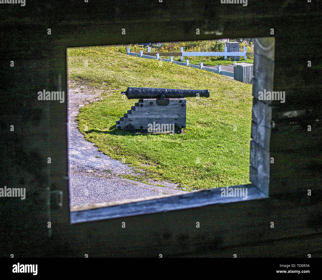 St John, New Brunswick, Canada. 6th Sep, 2005. Seen through a fort window, an archaic cannon in