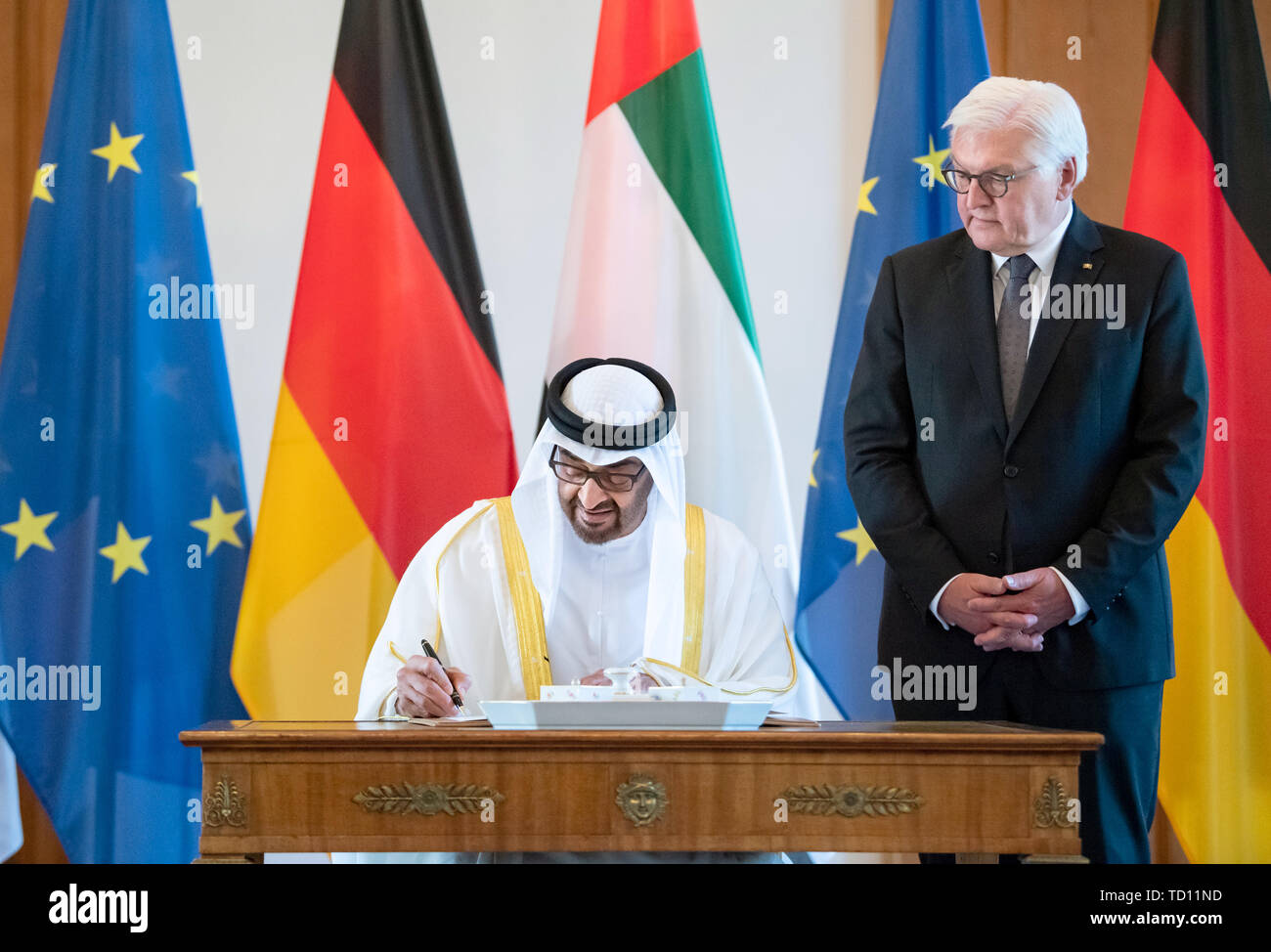 Berlin, Germany. 11th June, 2019. Sheikh Mohammed bin Said Al Nahjan, Crown Prince of Abu Dhabi and Deputy Commander-in-Chief of the Armed Forces of the United Arab Emirates, has signed the guest book in Bellevue Castle in the presence of Federal President Frank-Walter Steinmeier. Credit: Bernd von Jutrczenka/dpa/Alamy Live News Stock Photo