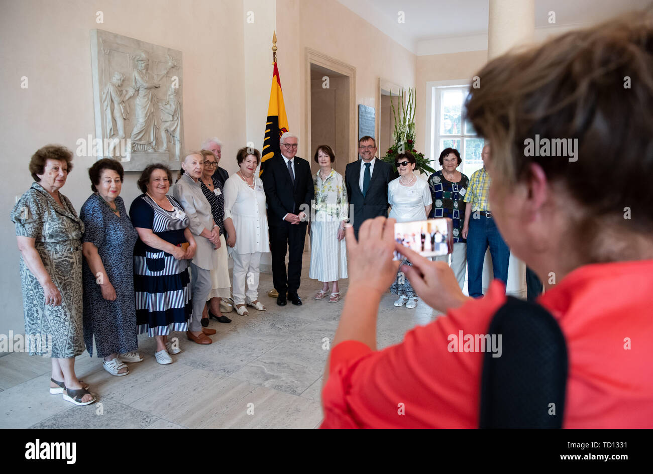 Berlin, Germany. 11th June, 2019. Federal President Frank-Walter Steinmeier welcomes Holocaust survivors from Lithuania for an interview at Bellevue Castle. The group visits Berlin at the invitation of the Maximilian-Kolbe-Werk. According to the Maximilian Kolbe plant, more than 20,000 former prisoners of German concentration camps and ghettos still live in the countries of Central and Eastern Europe. Credit: Bernd von Jutrczenka/dpa/Alamy Live News Stock Photo