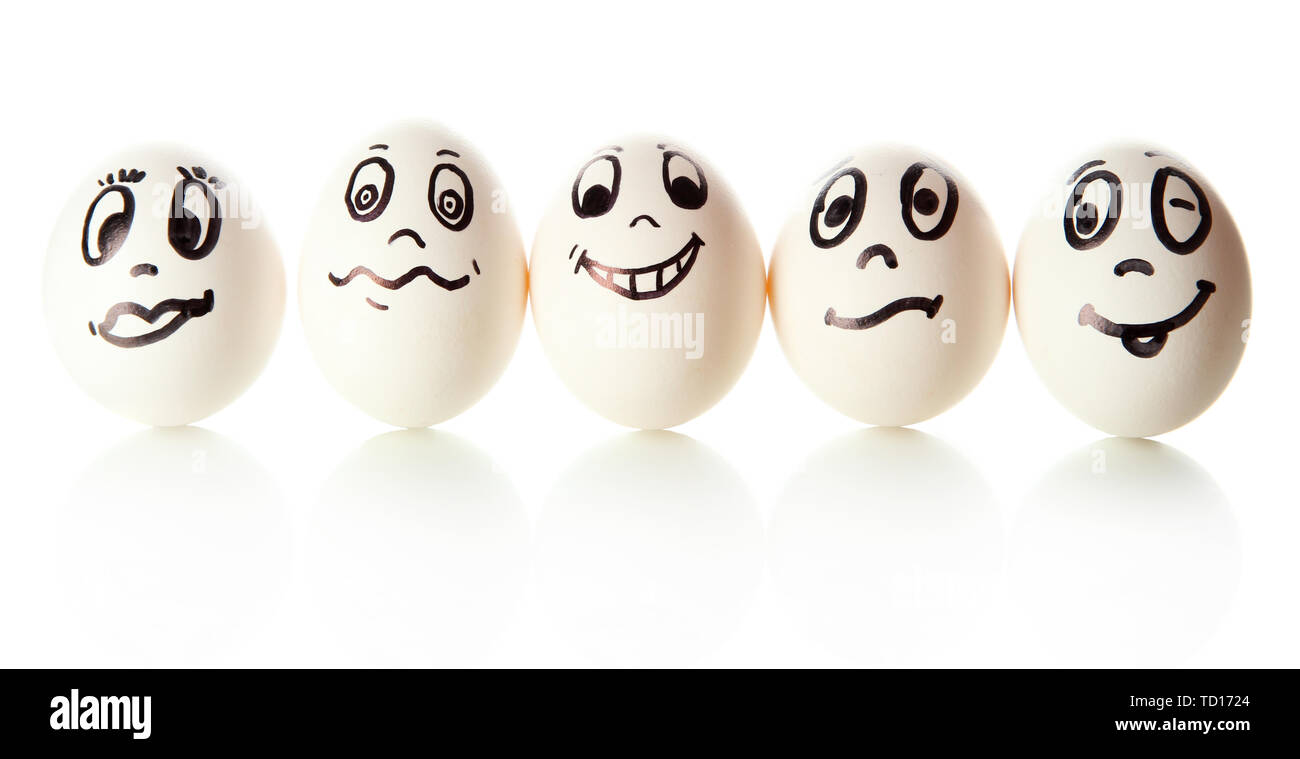 Eggs with funny faces isolated on white Stock Photo - Alamy