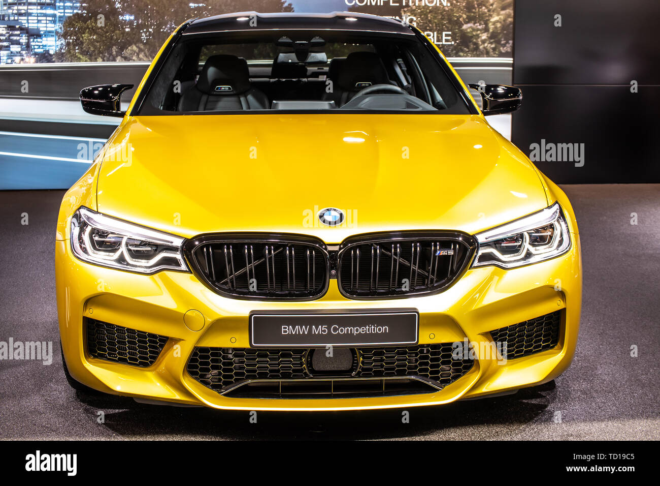 Geneva, Switzerland, March 05, 2019: metallic yellow BMW M5 Sedan  Competition at Geneva International Motor Show, manufactured and marketed  by BMW Stock Photo - Alamy