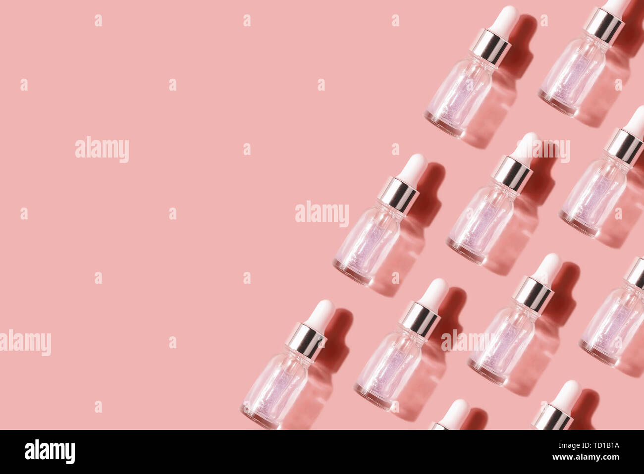 The pattern, the background of their transparent bottles with cosmetic. The concept of cosmetic injection is hyaluronic acid, botulin, serum. Flat lay Stock Photo