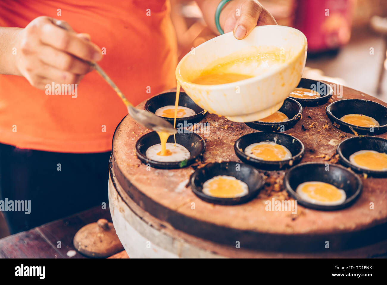 Vietnamese mini fried eggs, cooking on the street Traditional Vietnamese foo Stock Photo Alamy