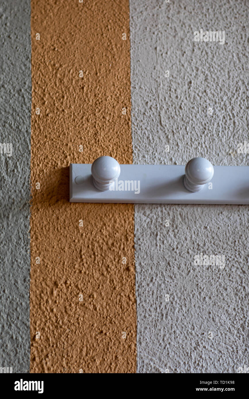 Coat rack and wall box with different colors and texture with relief Stock Photo