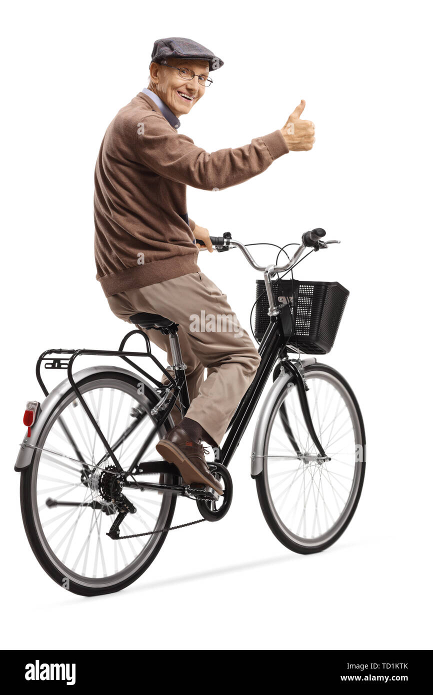 Full length shot of a cheerful elderly man on a bicycle giving thumbs up isolated on white background Stock Photo