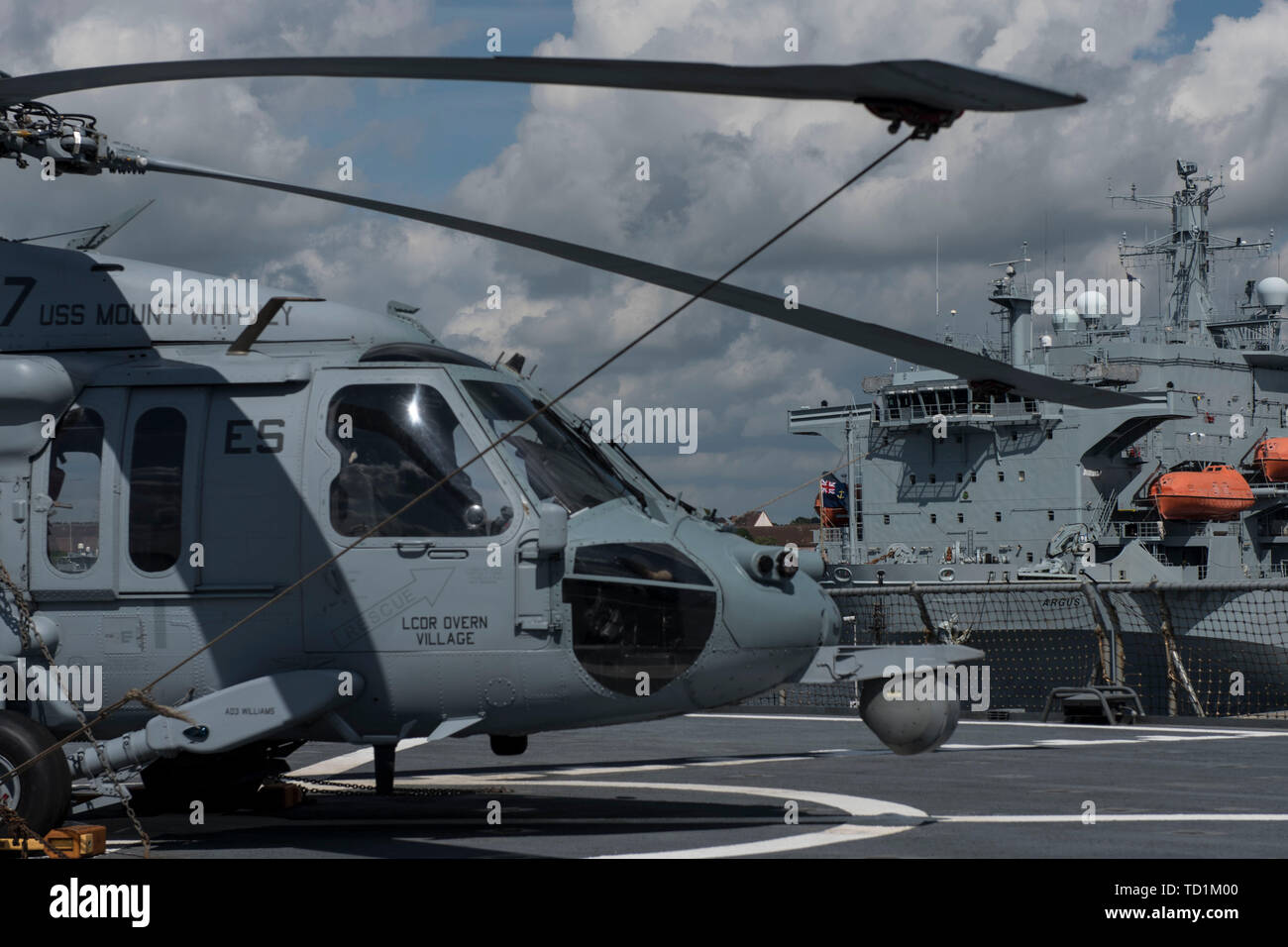 190609-N-DP001-0065 BALTIC SEA (June 09, 2019) An MH-60S Seahawk Helicopter assigned to DET 1 (Ghostriders) of Helicopter Sea Combat Squadron (HSC) 28, the Dragon Whales, awaits on the deck of the Blue Ridge-class command and control ship USS Mount Whitney (LCC 20) as the ship gets underway in support of exercise Baltic Operations (BALTOPS) 2019. BALTOPS is the premier annual maritime-focused exercise in the Baltic Region, marking the 47th year of one of the largest exercises in Northern Europe enhancing flexibility and interoperability among allied and partner nations. (U.S. Navy photo by Mas Stock Photo