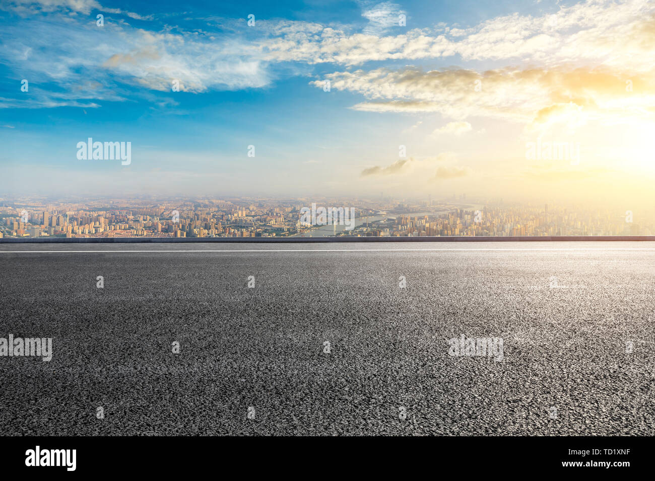 Empty highway road and modern city skyline in Shanghai,China Stock Photo