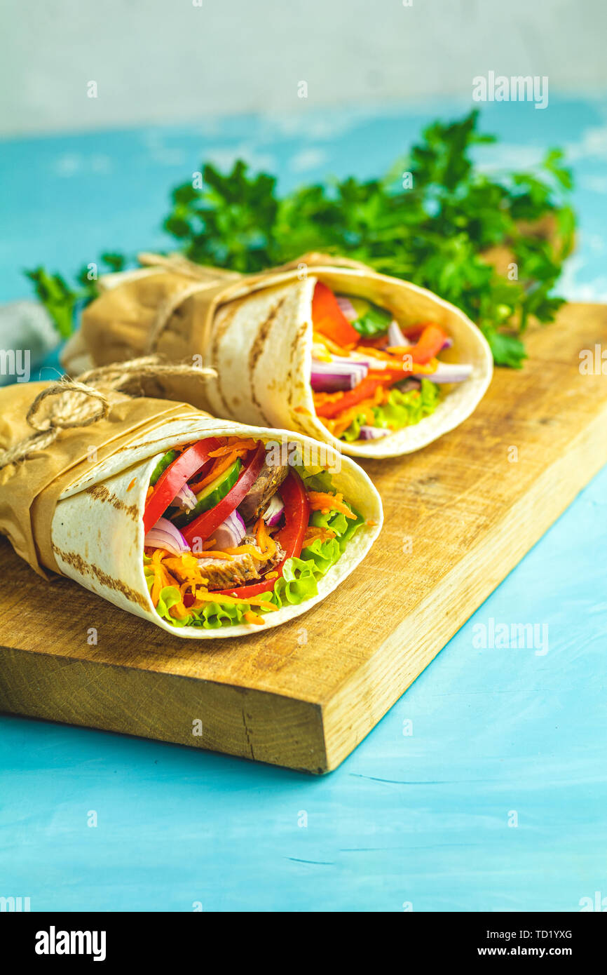 Shawarma sandwich gyro fresh roll of lavash (pita bread) chicken beef