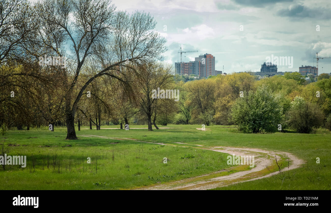 Construction cranes against evening hi-res stock photography and images ...